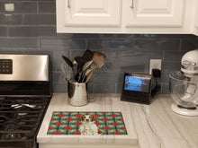 Load image into Gallery viewer, Liver and White Brittany Christmas PoinsettIas Glass Cutting Board