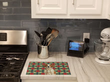 Load image into Gallery viewer, Roan Brittany Christmas PoinsettIas Glass Cutting Board