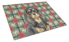 Load image into Gallery viewer, Black and Tan Cavalier Spaniel Christmas PoinsettIas Glass Cutting Board