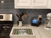Load image into Gallery viewer, White with Gray Coton de Tulear Christmas PoinsettIas Glass Cutting Board