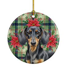 Load image into Gallery viewer, Black and Tan Dachshund Christmas PoinsettIas Ceramic Ornament