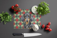 Load image into Gallery viewer, Black and Tan Dachshund Christmas PoinsettIas Glass Cutting Board