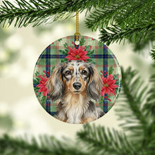 Load image into Gallery viewer, Longhaired Dapple Dachshund Christmas PoinsettIas Ceramic Ornament