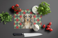Load image into Gallery viewer, Longhaired Dapple Dachshund Christmas PoinsettIas Glass Cutting Board