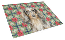 Load image into Gallery viewer, Longhaired Dapple Dachshund Christmas PoinsettIas Glass Cutting Board