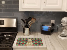 Load image into Gallery viewer, Wheaten Irish Wolfhound Christmas PoinsettIas Glass Cutting Board