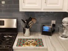 Load image into Gallery viewer, Gold Lhasa Apso Christmas PoinsettIas Glass Cutting Board