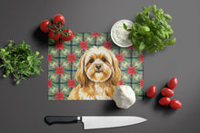 Load image into Gallery viewer, Gold Lhasa Apso Christmas PoinsettIas Glass Cutting Board