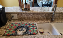 Load image into Gallery viewer, Black and Tan Pekingese Christmas PoinsettIas Dish Drying Mat