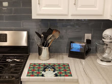 Load image into Gallery viewer, Tricolor Sheltie Christmas PoinsettIas Glass Cutting Board