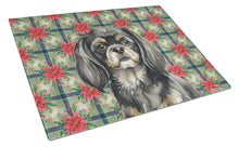 Load image into Gallery viewer, Black and Tan Tibetan Spaniel Christmas PoinsettIas Glass Cutting Board