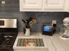 Load image into Gallery viewer, Red Tibetan Spaniel Christmas PoinsettIas Glass Cutting Board