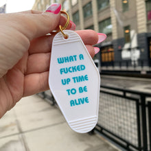 Load image into Gallery viewer, What a Fucked Up Time to Be Alive Motel Style Keychain in White