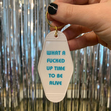Load image into Gallery viewer, What a Fucked Up Time to Be Alive Motel Style Keychain in White