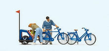 Load image into Gallery viewer, Preiser 10635 HO Scale Family Getting Ready for Bicycle Ride
