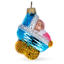 Load image into Gallery viewer, Newborn Baby Girl Wrapped in Blanket Inside a Stroller Glass Christmas Ornament