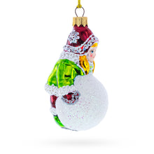 Load image into Gallery viewer, Girl Making a Snowball Glass Christmas Ornament