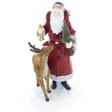 Load image into Gallery viewer, Santa Holding Christmas Tree and Bell by Reindeer Figurine 12 Inches