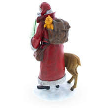 Load image into Gallery viewer, Santa Holding Christmas Tree and Bell by Reindeer Figurine 12 Inches