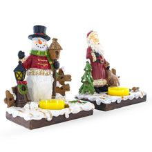 Load image into Gallery viewer, Set of 2 Santa and Snowman Candle Holders 6 Inches