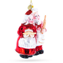 Load image into Gallery viewer, Mr. and Mrs. Santa Baking Cake Glass Christmas Ornament