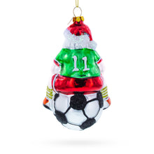 Load image into Gallery viewer, Santa Sitting on Soccer Ball Glass Christmas Ornament