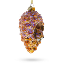 Load image into Gallery viewer, Squirrel Nestled in Pine Cone Glass Christmas Ornament