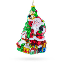 Load image into Gallery viewer, Santa’s Toyland Under the Tree Glass Christmas Ornament