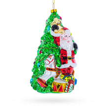 Load image into Gallery viewer, Santa’s Toyland Under the Tree Glass Christmas Ornament