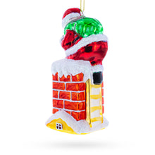 Load image into Gallery viewer, Santa Going Down the Chimney Glass Christmas Ornament