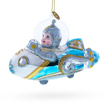 Load image into Gallery viewer, Astronaut Driving Spaceship Glass Christmas Ornament