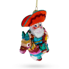 Load image into Gallery viewer, Santa Riding a Festive Pinata Glass Christmas Ornament