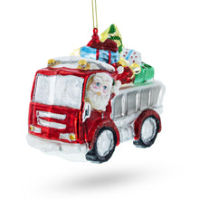 Load image into Gallery viewer, Santa Driving a Dump Truck Full of Presents Glass Christmas Ornament