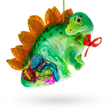 Load image into Gallery viewer, Green Dinosaur with Gifts Glass Christmas Ornament