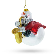 Load image into Gallery viewer, Jazzy Snowman Playing Saxophone Glass Christmas Ornament