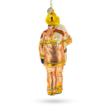 Load image into Gallery viewer, Heroic Fireman with Hose Glass Christmas Ornament