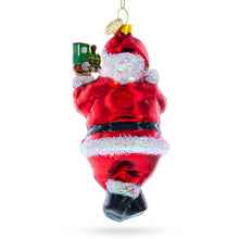 Load image into Gallery viewer, Santa Decorating the Train Glass Christmas Ornament