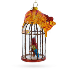 Load image into Gallery viewer, Cat on Birdcage with Parrot Glass Christmas Ornament