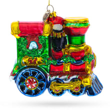 Load image into Gallery viewer, Playful Penguins Riding Train Glass Christmas Ornament