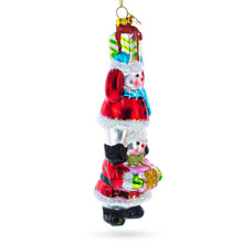 Load image into Gallery viewer, Snowmen Friends Sharing Gifts Glass Christmas Ornament