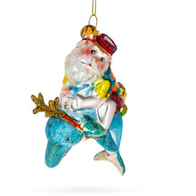 Load image into Gallery viewer, Santa Diver Riding Dolphin Glass Christmas Ornament
