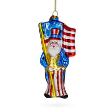 Load image into Gallery viewer, Uncle Sam Santa Holding USA Flag Glass Christmas Ornament