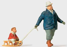 Load image into Gallery viewer, Preiser 28078 HO Scale Individual Figures Man Pulling Child on Sled