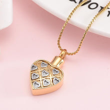 Load image into Gallery viewer, Gold Heart Shaped Cremation Urn Necklace With Silver Hearts