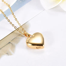 Load image into Gallery viewer, Gold/Silver Highly Polished Heart Cremation Urn Necklace