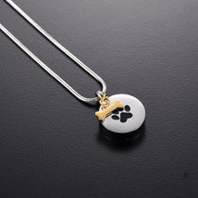 Load image into Gallery viewer, Golden Dog Bone Charm &amp; Paw Print Cremation Urn Necklace