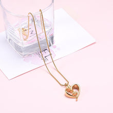 Load image into Gallery viewer, Paw Print In Heart Pet Cremation Urn Necklace