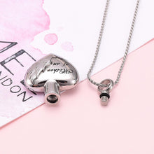 Load image into Gallery viewer, Silver Heart Shaped Cremation Urn Necklace With Angel Wings Engraved "Mother Of An Angel"