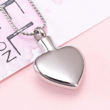 Load image into Gallery viewer, Silver Heart Shaped Cremation Urn Necklace With Angel Wings Engraved "Mother Of An Angel"