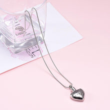 Load image into Gallery viewer, Silver Heart Shaped Cremation Urn Necklace With Angel Wings Engraved "Mother Of An Angel"